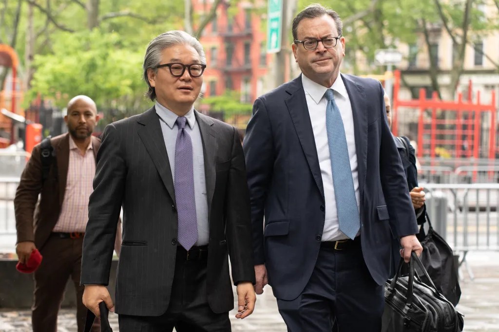 Bill Hwang, Chief Executive Officer and founder of Archegos Capital Management, left, accompanied by attorney Barry Berke, arrives at federal court in New York, US.
Image Source: New York Post